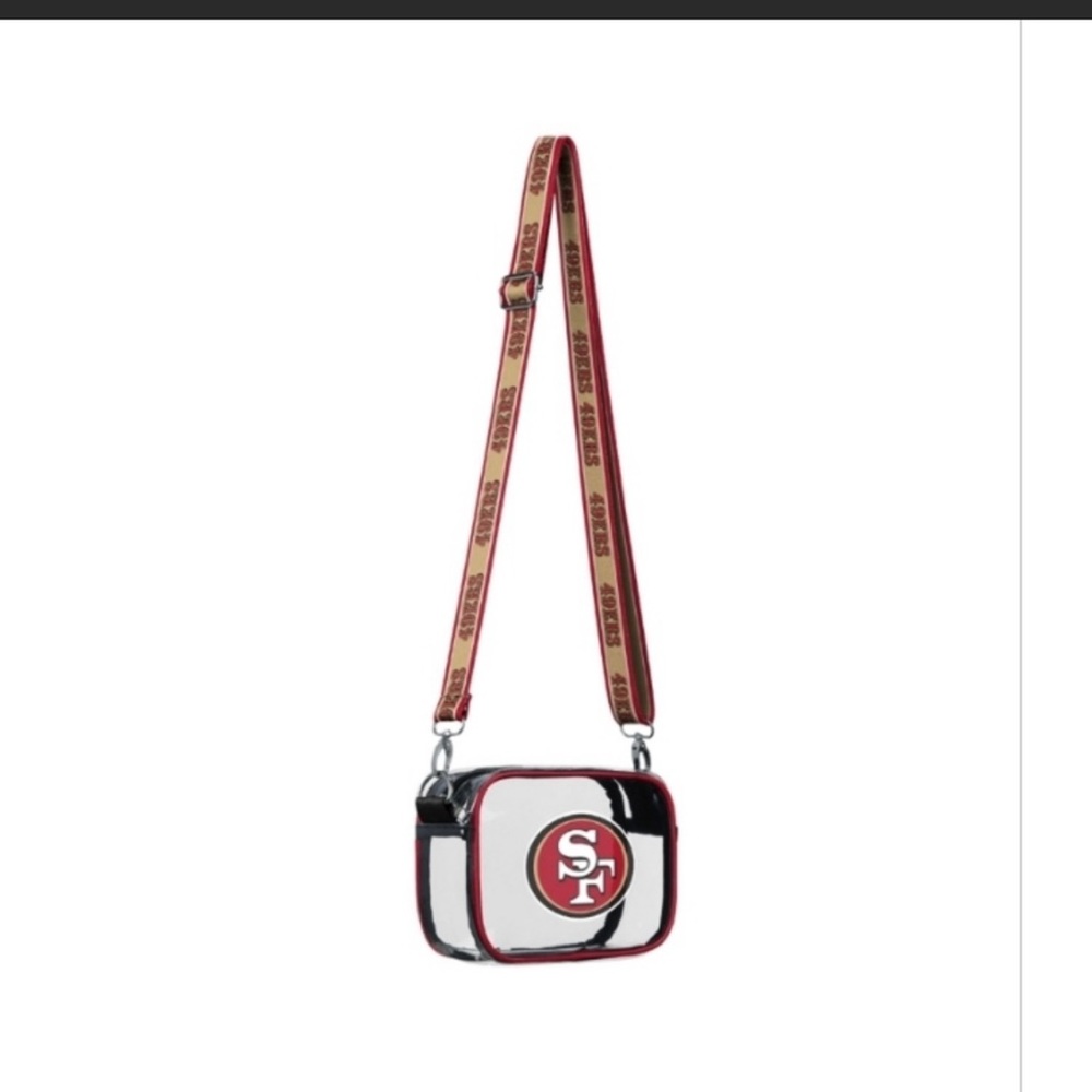 SF 49ers Clear Crossbody Camera Bag. 100% PVC. 3” L x 8.25” W x 5.25”H.